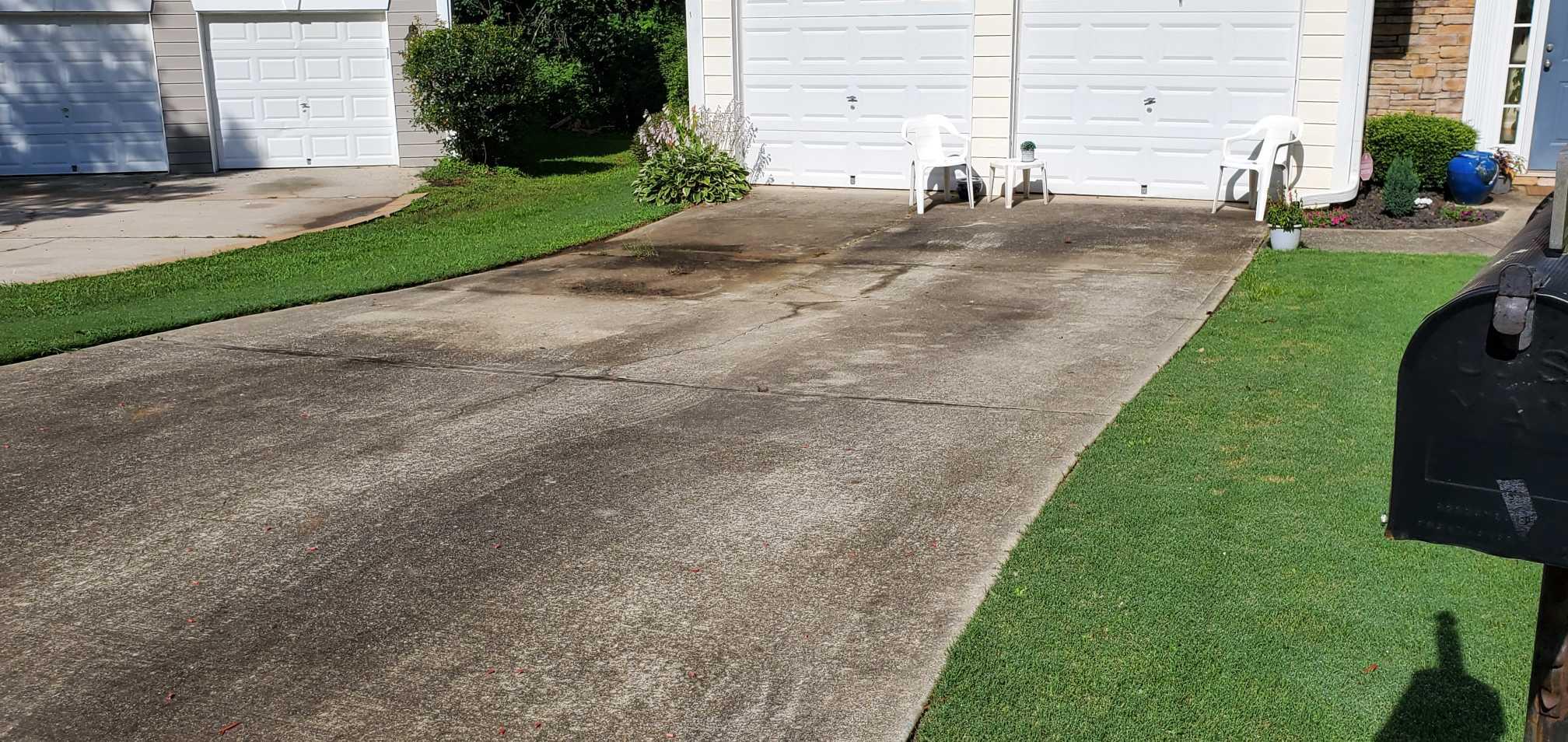 Before - Residential driveway pressure washing transformation